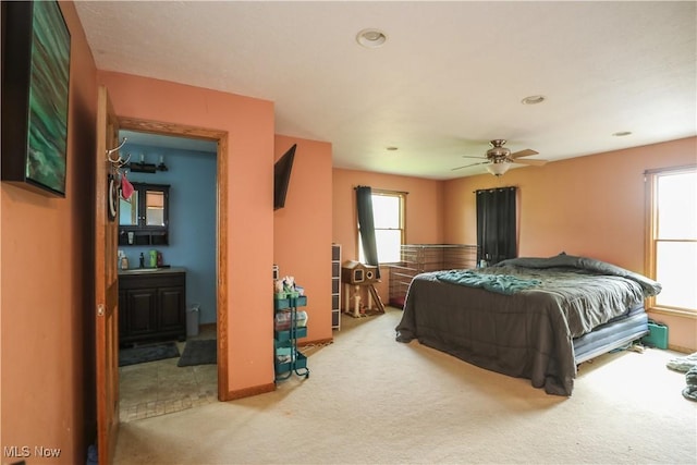 4217 State Route 82, Mantua, OH 44255 - carpeted bedroom featuring multiple windows, a sink, ceiling fan, and recessed lighting