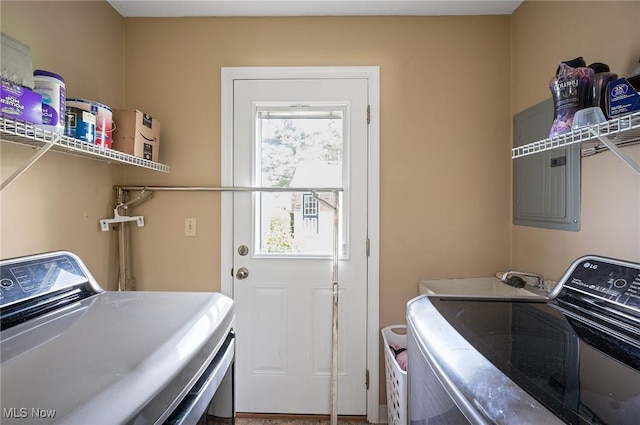 laundry room featuring washer and clothes dryer