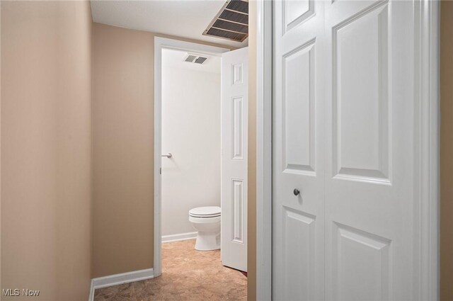 corridor with baseboards