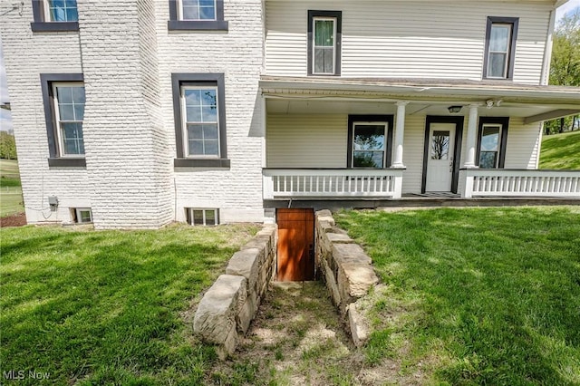 3153 SW Boltz Orchard Rd, Sugarcreek, OH 44681 - entrance to property with a yard and covered porch