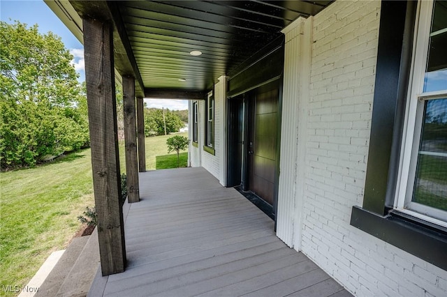 3153 SW Boltz Orchard Rd, Sugarcreek, OH 44681 - wooden deck featuring a lawn