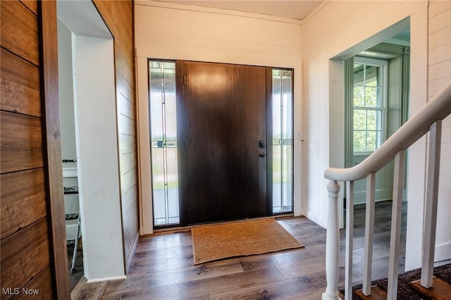 3153 SW Boltz Orchard Rd, Sugarcreek, OH 44681 - foyer with dark wood-style floors and stairs