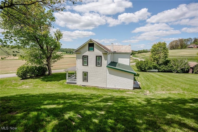 3153 SW Boltz Orchard Rd, Sugarcreek, OH 44681 - view of home's exterior featuring a lawn