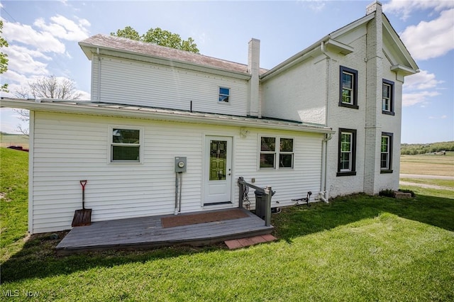 3153 SW Boltz Orchard Rd, Sugarcreek, OH 44681 - back of property featuring a chimney and a yard