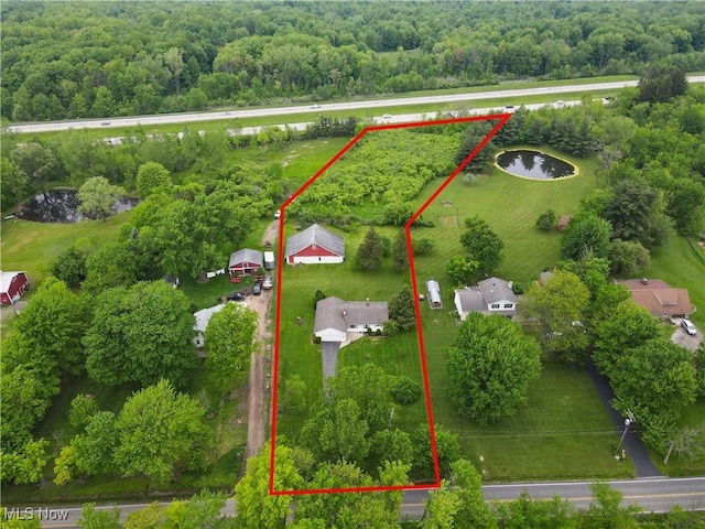 12395 Carter Rd, Concord, OH 44077 - aerial view of property's location with property boundaries highlighted, a large body of water, and a forest