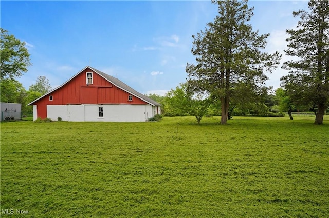 12395 Carter Rd, Concord, OH 44077 - view of green lawn with a barn and an outbuilding
