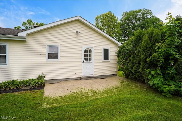 12395 Carter Rd, Concord, OH 44077 - rear view of house featuring a yard and roof with shingles