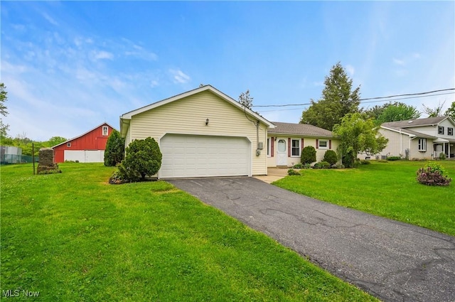12395 Carter Rd, Concord, OH 44077 - single story home with driveway, a front yard, and a garage