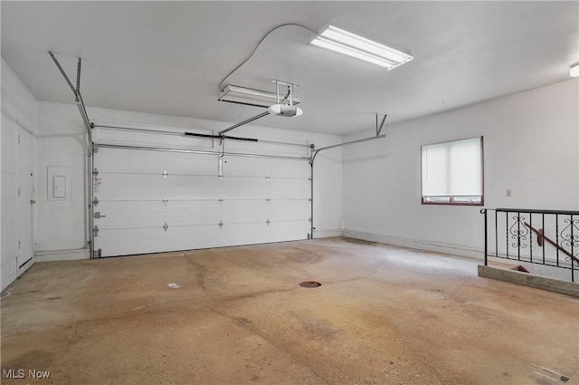 12395 Carter Rd, Concord, OH 44077 - garage featuring a garage door opener