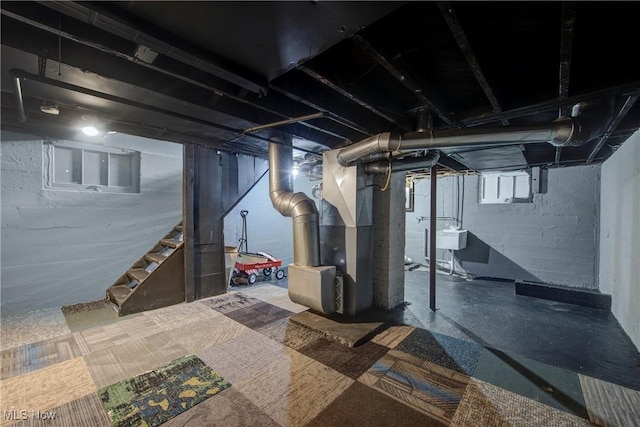 423 Kansas Ave, Lorain, OH 44052 - basement with stairway and heating unit