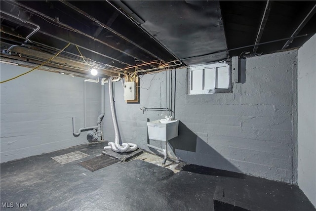 423 Kansas Ave, Lorain, OH 44052 - basement with a sink and electric panel
