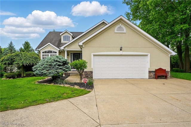6868 Twin Oaks Ct, Canfield, OH 44406 - view of front of property with stone siding, a front yard, and stucco siding