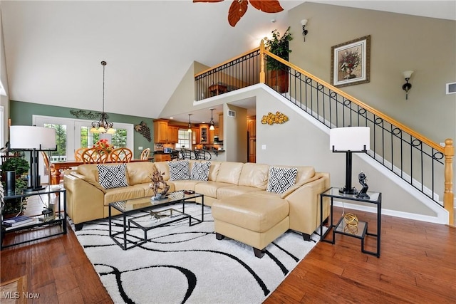 6868 Twin Oaks Ct, Canfield, OH 44406 - living area with hardwood / wood-style floors, stairway, high vaulted ceiling, and a ceiling fan