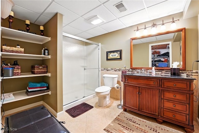 6868 Twin Oaks Ct, Canfield, OH 44406 - bathroom featuring a shower stall, tile patterned flooring, toilet, vanity, and tile walls