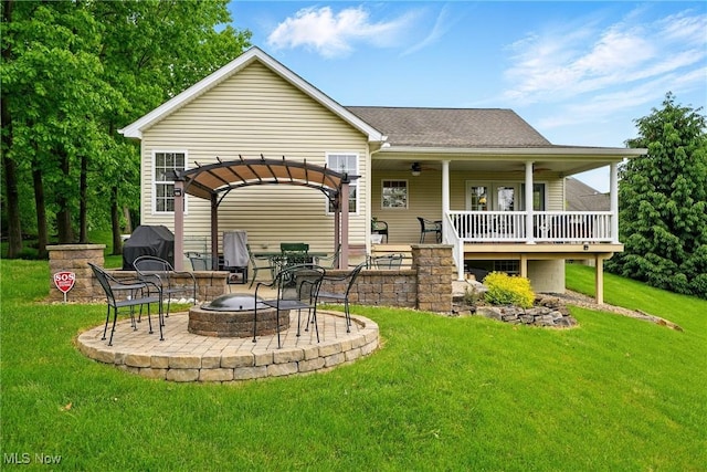 6868 Twin Oaks Ct, Canfield, OH 44406 - rear view of property featuring a fire pit, a yard, a pergola, a patio, and roof with shingles