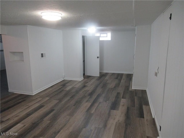 1397 Sunset Rd, Mayfield Heights, OH 44124 - below grade area featuring wood finished floors and baseboards