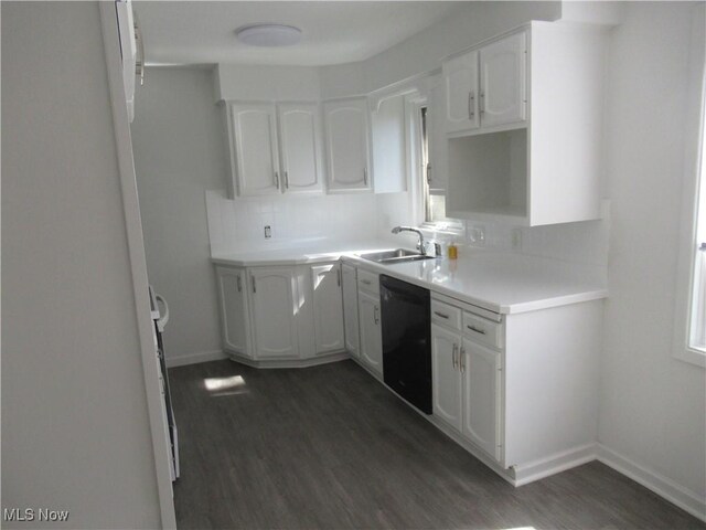 1397 Sunset Rd, Mayfield Heights, OH 44124 - kitchen featuring dishwasher, a sink, white cabinets, and dark wood-type flooring