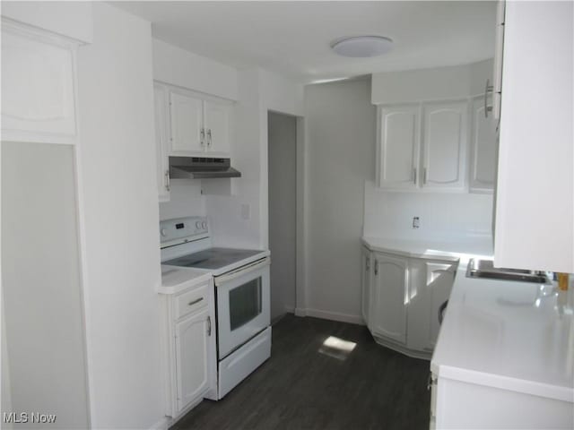 1397 Sunset Rd, Mayfield Heights, OH 44124 - kitchen featuring electric range, under cabinet range hood, white cabinetry, and dark wood-style floors