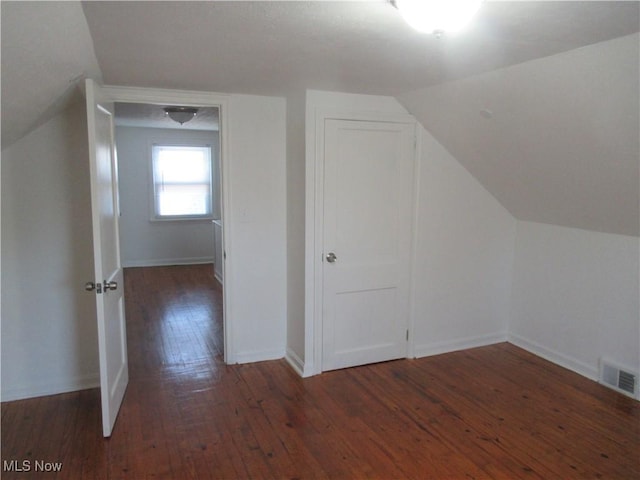 1397 Sunset Rd, Mayfield Heights, OH 44124 - additional living space featuring lofted ceiling, hardwood / wood-style floors, and baseboards