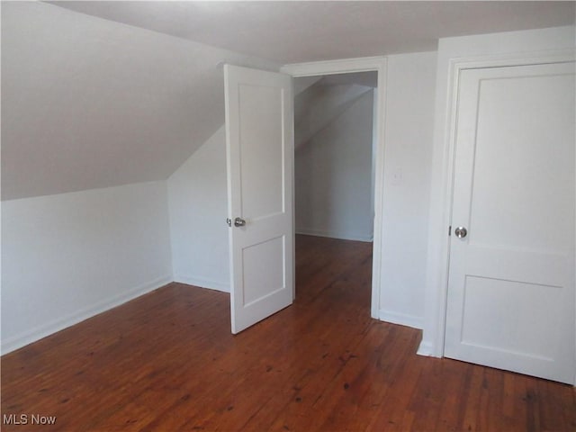 1397 Sunset Rd, Mayfield Heights, OH 44124 - bonus room featuring vaulted ceiling, hardwood / wood-style floors, and baseboards
