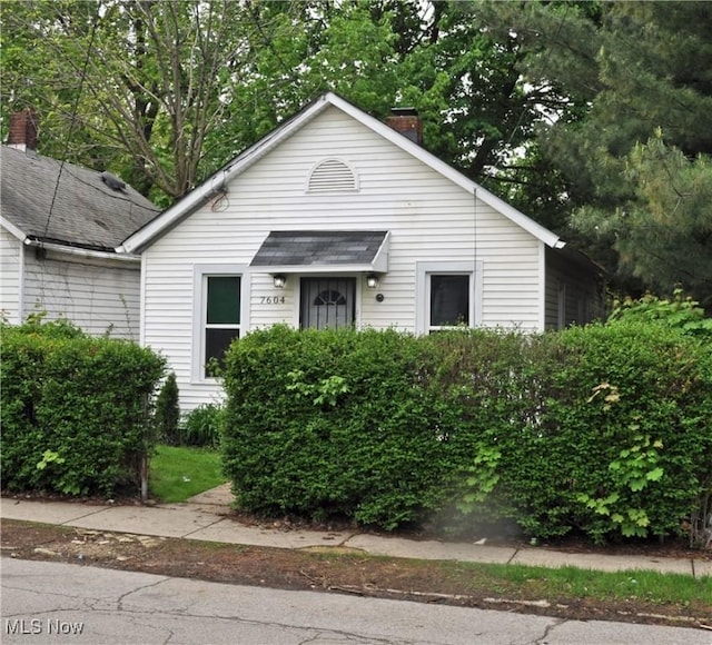 view of front of home with a chimney