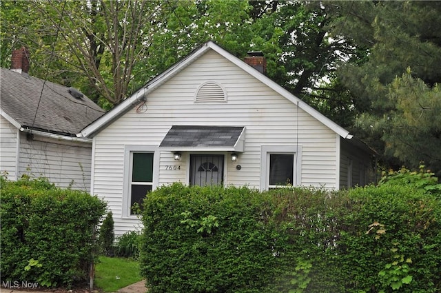 view of front of property featuring a chimney