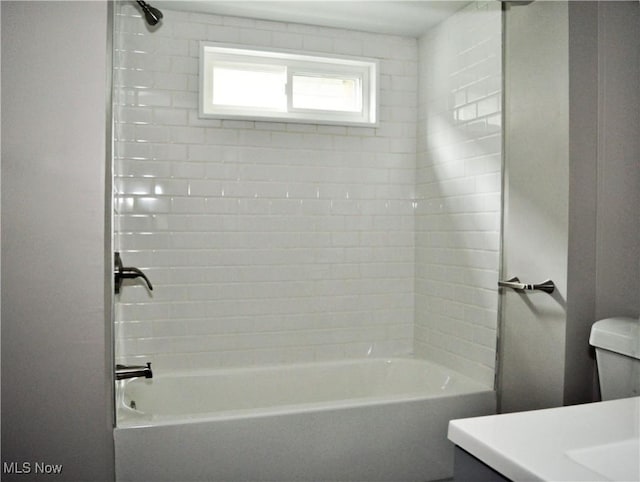 full bathroom featuring vanity, shower / bath combination, and toilet