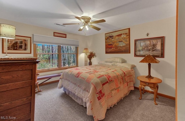 38 Choctaw Trl, Malvern, OH 44644 - carpeted bedroom featuring baseboards and ceiling fan
