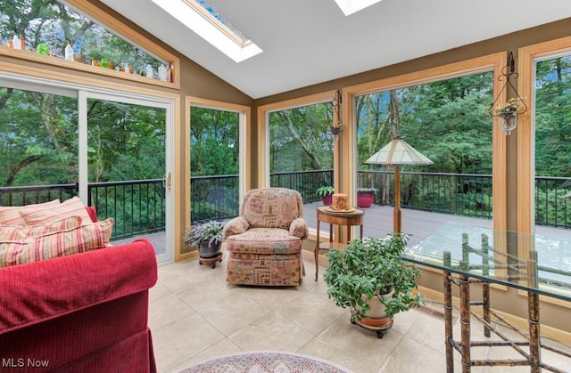 38 Choctaw Trl, Malvern, OH 44644 - sunroom with tile patterned flooring, vaulted ceiling, and a skylight
