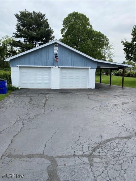1912 Lisbon St, East Liverpool, OH 43920 - garage featuring a detached garage
