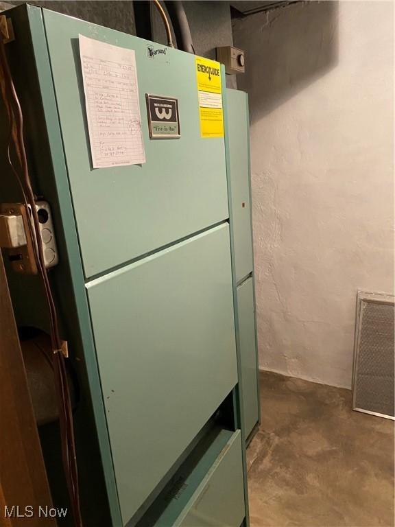 1912 Lisbon St, East Liverpool, OH 43920 - basement view of freestanding refrigerator and concrete floors