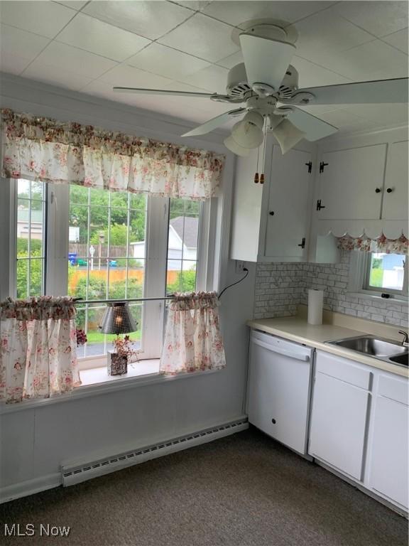1912 Lisbon St, East Liverpool, OH 43920 - kitchen featuring a baseboard radiator, dishwasher, and healthy amount of natural light
