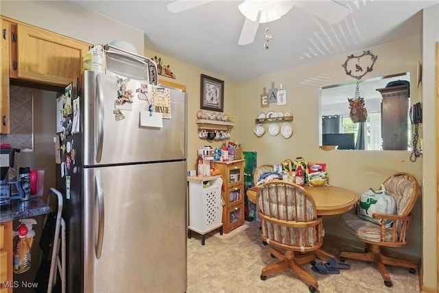 dining space with a ceiling fan