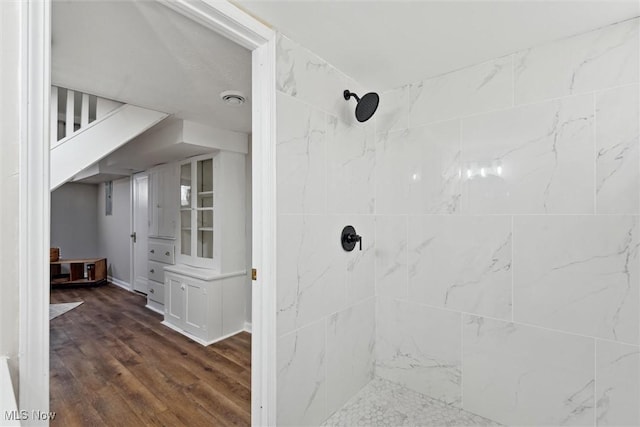 3569 Silsby Rd, University Heights, OH 44118 - bathroom with tiled shower and wood finished floors