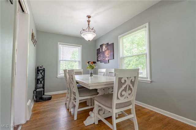 2930 Archwood Pl, Cuyahoga Falls, OH 44221 - dining area featuring light wood-style flooring and baseboards