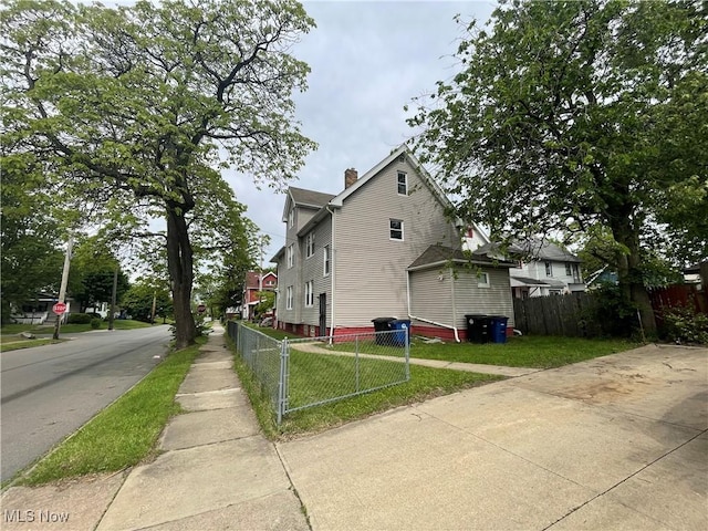 view of home's exterior featuring a chimney