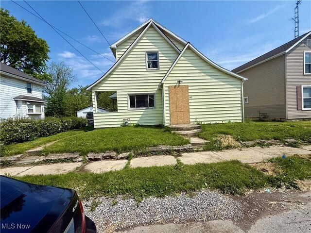 406 Ewing Ave, Lima, OH 45801 - view of front of house featuring a front yard
