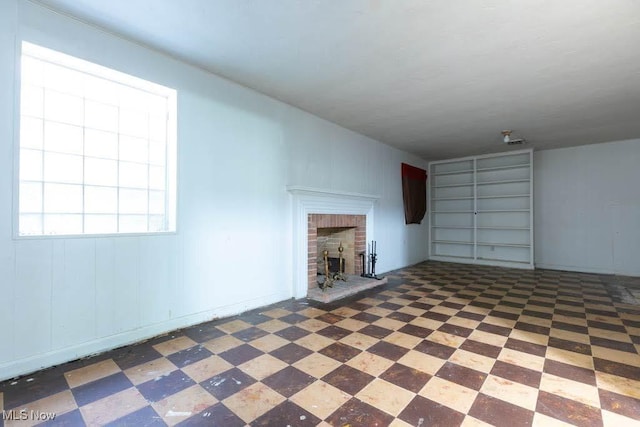 4020 Colony Rd, South Euclid, OH 44121 - unfurnished living room with a brick fireplace