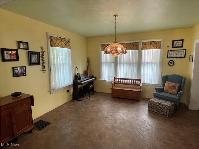 1605 E 46th St, Ashtabula, OH 44004 - living area with a chandelier