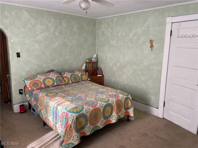 1605 E 46th St, Ashtabula, OH 44004 - carpeted bedroom with a ceiling fan and ornamental molding
