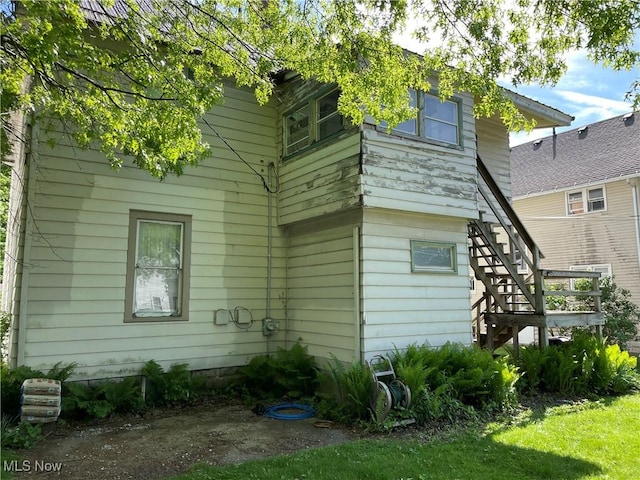 1605 E 46th St, Ashtabula, OH 44004 - view of side of property with stairs