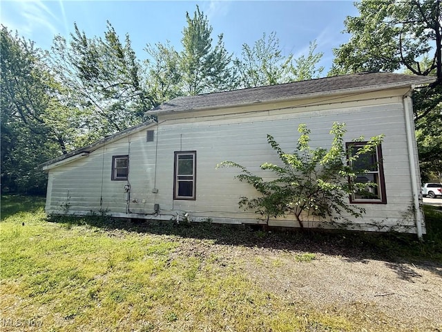 670 N W St, Lima, OH 45801 - view of home's exterior with a yard