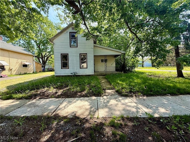 670 N W St, Lima, OH 45801 - view of front facade featuring covered porch