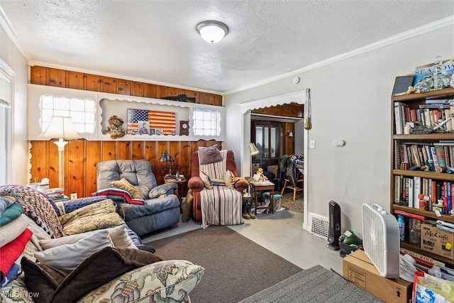 4202 Walter Ave, Parma, OH 44134 - living area featuring a textured ceiling and crown molding