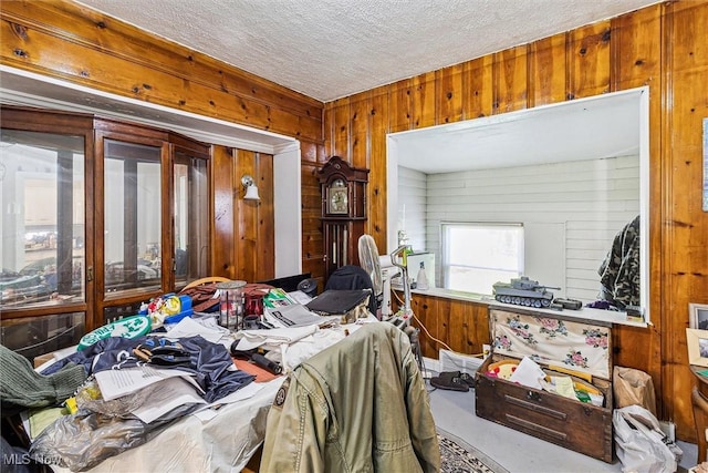 4202 Walter Ave, Parma, OH 44134 - misc room with wooden walls and a textured ceiling
