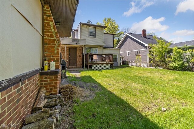 4202 Walter Ave, Parma, OH 44134 - view of green lawn featuring a deck