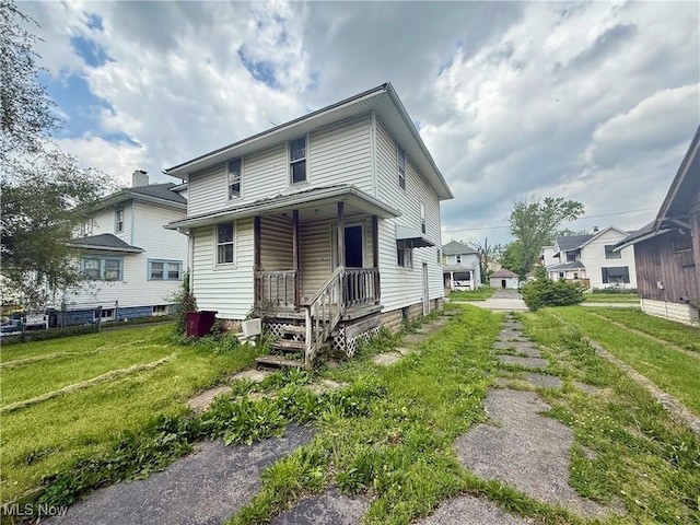 812 E Vine St, Lima, OH 45804 - view of front facade with a front yard