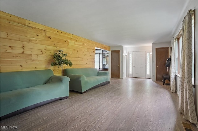 7182 Stewart Sharon Rd, Hubbard, OH 44425 - living area featuring wood finished floors and wood walls