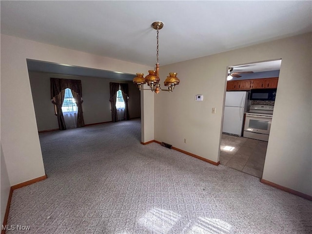 100 Chadwick Ln, Austintown, OH 44515 - unfurnished dining area featuring a chandelier, light carpet, ceiling fan, and baseboards