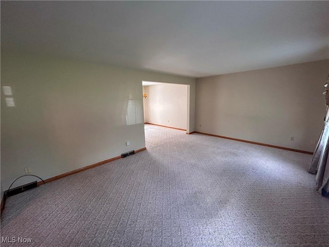100 Chadwick Ln, Austintown, OH 44515 - carpeted spare room featuring baseboards